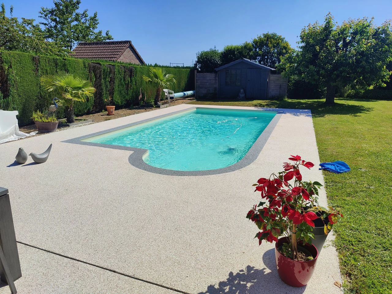 Pose de tapis de pierre en granulats de marbre